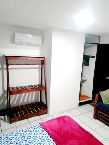 Postel nebo postele na pokoji v ubytování Confortable Suite con terrza