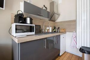 Dapur atau dapur kecil di le 31 Au Coeur des Places +29 gambar