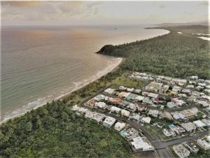 an aerial view of a resort next to the ocean at 5 bedroom Exclusive Beach Villa - WOW! villa in Punta Santiago