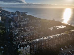 an aerial view of a city next to the ocean at Durley Gardens, by the Beach in Bournemouth