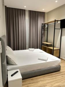 Postel nebo postele na pokoji v ubytování Hotel Rai