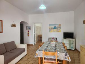 TV a/nebo společenská místnost v ubytování Villetta Alessia