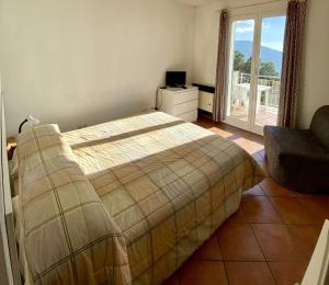 Posteľ alebo postele v izbe v ubytovaní Agriturismo L'Ulivo E Il Mare