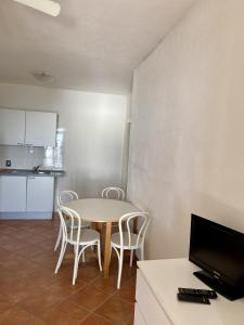Kuchyňa alebo kuchynka v ubytovaní Agriturismo L'Ulivo E Il Mare