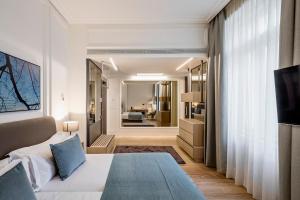 Gulta vai gultas numurā naktsmītnē BoHo Prague Hotel - Small Luxury Hotels