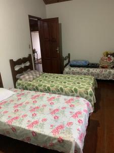 Un ou plusieurs lits dans un hébergement de l'établissement Hostel do Mirante