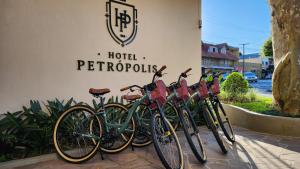 a row of bikes parked in front of a hotel restrooms at Hotel Petrópolis in Nova Petrópolis