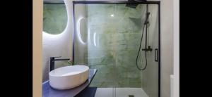a bathroom with a sink and a shower at Picasso 2 Luxury in Málaga