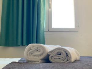 Postel nebo postele na pokoji v ubytování Hotel LLITERAS