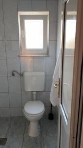 Koupelna v ubytování Apartmani Filip