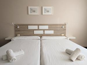 Postel nebo postele na pokoji v ubytování Apartamentos Turísticos Guillermo