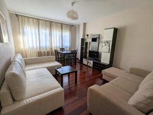 Posezení v ubytování Apartamentos Turísticos Guillermo