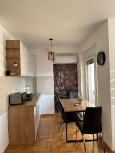 Kuchyň nebo kuchyňský kout v ubytování Afrodita apartman