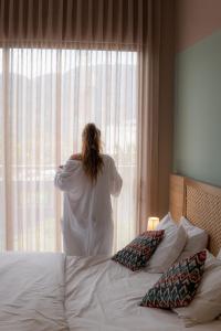 Postel nebo postele na pokoji v ubytování FR Hotel