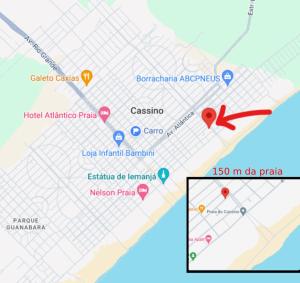 a map of the park with a red plane at Kitnet a 150m da praia com Ar Condicionado in Rio Grande