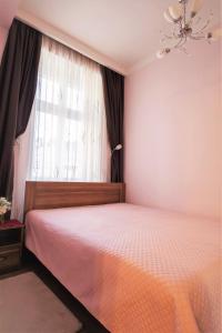 Postel nebo postele na pokoji v ubytování Apartmany u tri jehnatek