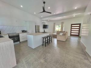 Kuchyň nebo kuchyňský kout v ubytování Taputu House Luxury Oasis