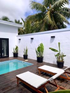 Bazén v ubytování Taputu House Luxury Oasis nebo v jeho okolí