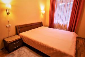 Postel nebo postele na pokoji v ubytování Apartmany u tri jehnatek
