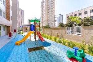 a playground with a slide and a slide at Apto Confortável prox ao Allianz in Sao Paulo