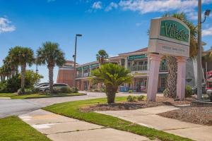 a view of a vlasica building with palm trees at North Lost Key Landing 2B in Pensacola