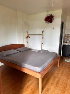 Postel nebo postele na pokoji v ubytování Cris & Mar Homestay