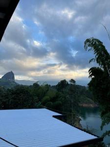 a view of a river from a roof of a building at Hermoso apartamento en Guatape Antioquia in Guatapé