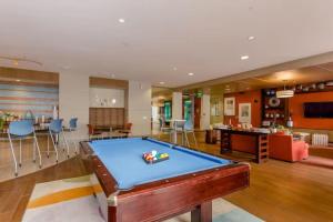 a living room with a pool table in it at Chic 1Br Near NRG With Pool WiFi FreeParking in Houston