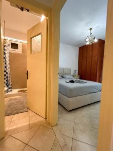 Postel nebo postele na pokoji v ubytování Zakynthos centro Riviera