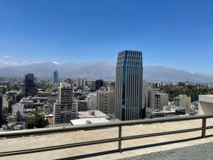a view of a city from a building at Atalaya Apartment Suite in Santiago