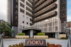 een nokia-bord voor een gebouw bij Noku Osaka in Osaka