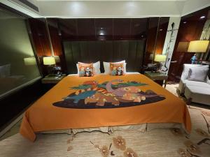 Llit o llits en una habitació de Estandon Hotel Guangzhou