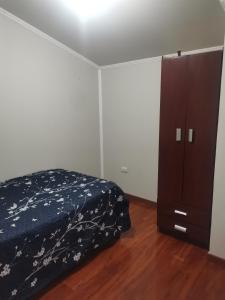 En eller flere senge i et værelse på ICARUMBI + 3 billeder