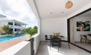 Πισίνα στο ή κοντά στο Indigo Suite Curaçao - A Brand New Modern Apartment on a secure resort close to the Beach