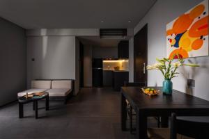 Posezení v ubytování Thè HEM Hotel and Apartment