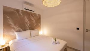 Ένα ή περισσότερα κρεβάτια σε δωμάτιο στο Indigo Suite Curaçao - A Brand New Modern Apartment on a secure resort close to the Beach