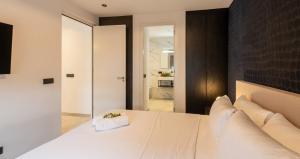 Ένα ή περισσότερα κρεβάτια σε δωμάτιο στο Indigo Suite Curaçao - A Brand New Modern Apartment on a secure resort close to the Beach