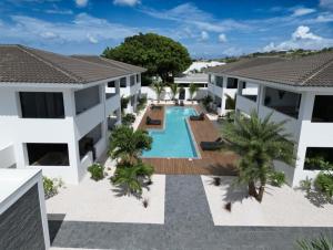 Πισίνα στο ή κοντά στο Indigo Suite Curaçao - A Brand New Modern Apartment on a secure resort close to the Beach