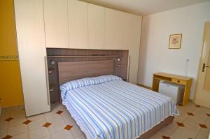 Postel nebo postele na pokoji v ubytování Le sorgenti camere e appartamenti