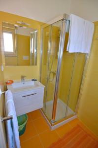Ванна кімната в Le sorgenti camere e appartamenti