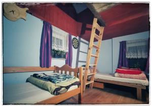 Posteľ alebo postele v izbe v ubytovaní Rancho Relaxo Czartoria Agroturystyka