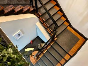 an overhead view of a staircase in a house at Tinka in Santiago