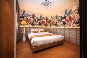 Postel nebo postele na pokoji v ubytování Daali Hotel & Apartment