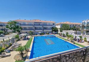 an overhead view of a swimming pool in front of a building at Mythical Sands 2 - D in Paralimni