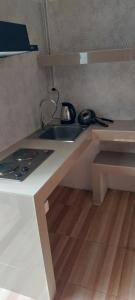 Kuchyň nebo kuchyňský kout v ubytování AVA Boutique Guesthouse