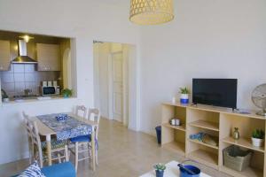 Η κουζίνα ή μικρή κουζίνα στο Iodio Studio - Cozy home with pool