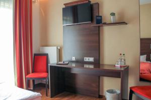 Postel nebo postele na pokoji v ubytování Hotel Auf der Bühn