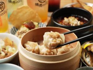 a bowl of food with a spoon in it at APA Hotel Sagamihara Hashimoto Ekimae in Sagamihara