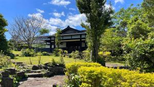 屋久島にある天然温泉と縄文の宿「まんてん」の庭中家