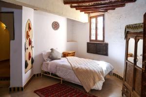 Postel nebo postele na pokoji v ubytování Dune House